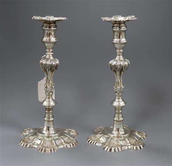 A pair of George II style silver candlesticks, Harrods Ltd, London 1969, 50.5 oz.